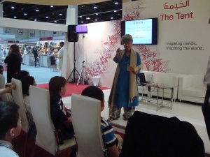 Reading my poem ‘On blushes, jealousy and skirts’ at ADIBF 2014 1
